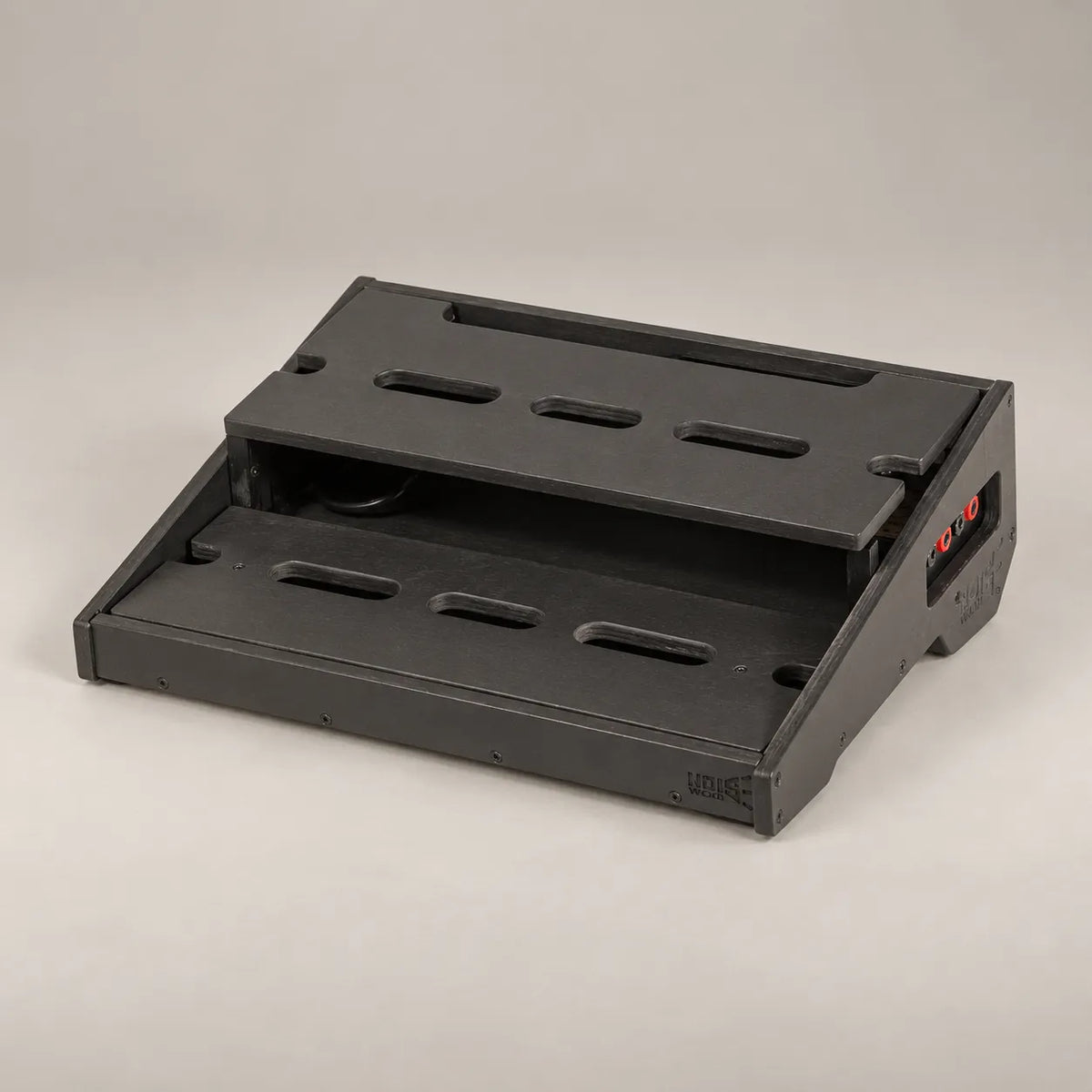 Core D340/450 Stealth Black wooden pedalboard, front three-quarter view