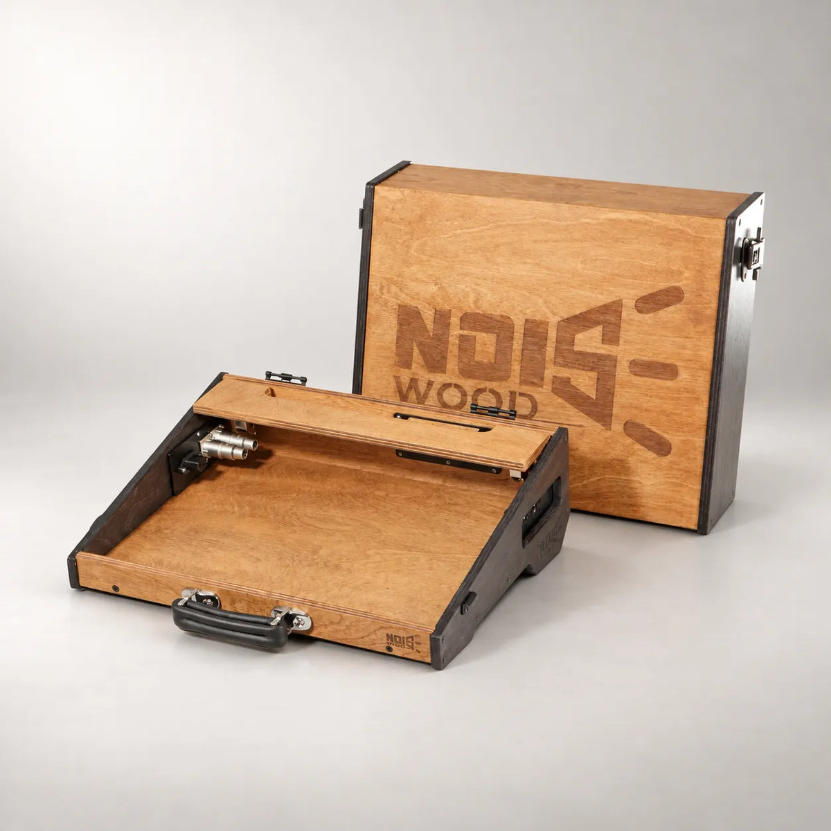 Noisewood Noble D340/450-TM pedalboard with the protective lid removed and standing behind the open board