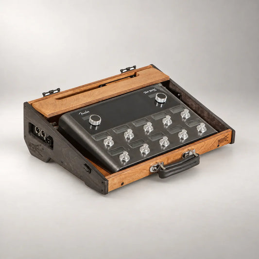 Noisewood Noble D340/450-TM pedalboard in duo-colour smoked oak with ebony black sides, with a Fender Tone Master Pro fitted in the top deck, three-quarter view