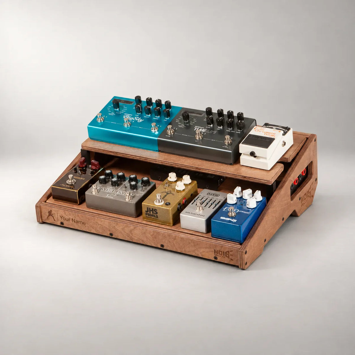 Studio D340/450 Walnut pedalboard in three-quarter view, loaded with boutique guitar pedals on both decks