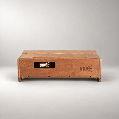 Illuminated Noisewood logo on the front panel of a Studio D340/450 Walnut pedalboard