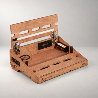 Studio D340/450 Walnut pedalboard with the top deck lifted, showing the internal connection panel and power